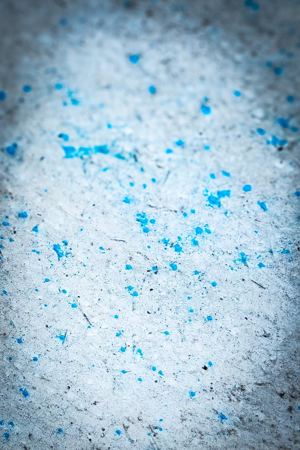 Texture lumineuse ponctuée de bleu